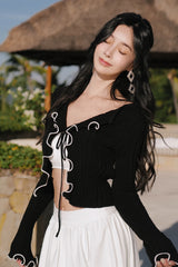 輕氧針織撞色荷葉邊綁帶外套<br>Wide Ribbed Knit Ruffle Hem Cardigan